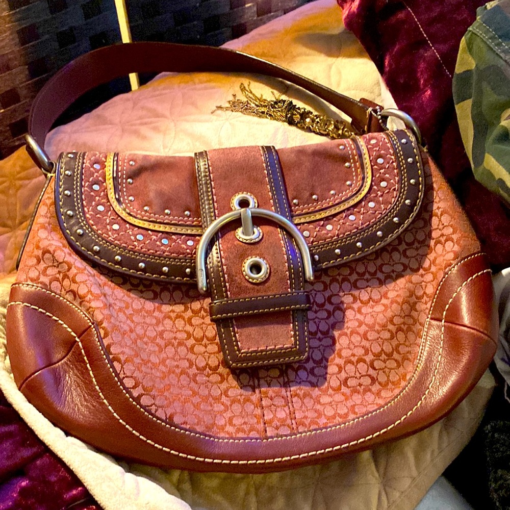 Beautiful boho saddle bag coach purse, very gently used